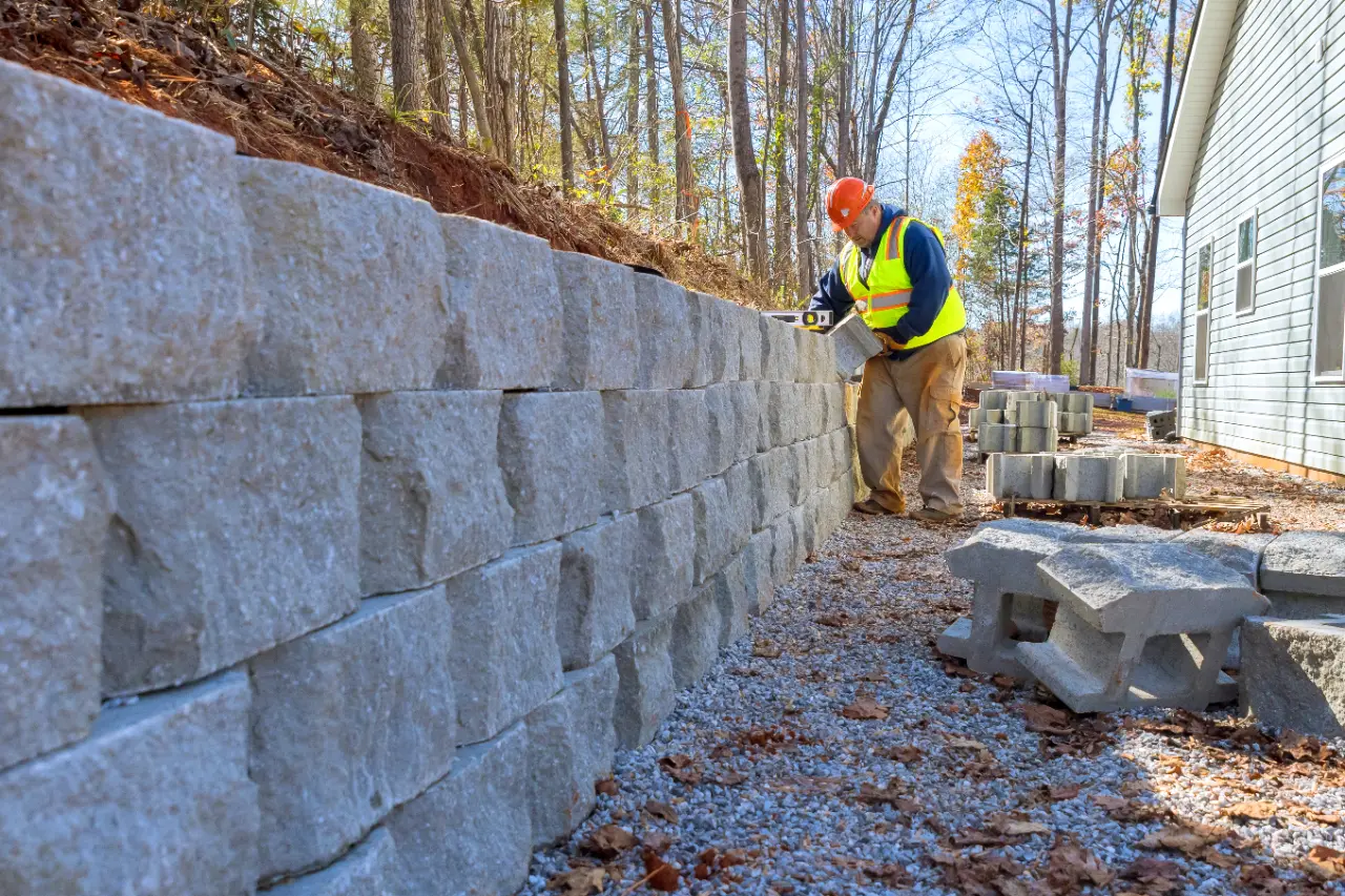 Block retaining wall being built in Connecticut